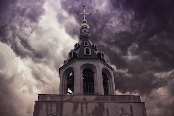 Concrete Cathedral Under Cloudy Sky