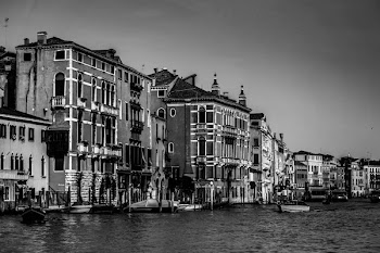 Concrete Houses Beside Body of Water