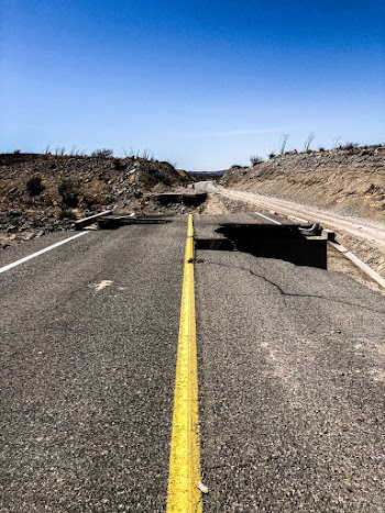 Concrete Road With Yellow Solid Line 