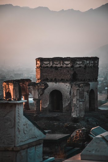 Concrete Ruins Near Mountain Range