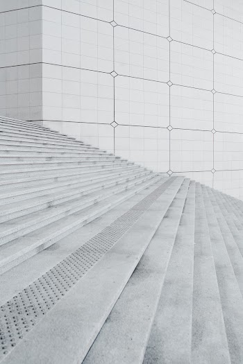 Concrete Stair near White Concrete Wall · Free Stock Photo