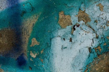 concrete with sprayed blue, teal, and white paint