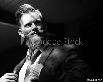Confidence businessman in suit standing