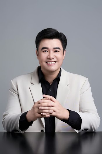 Confident Asian Businessman in Formal Attire