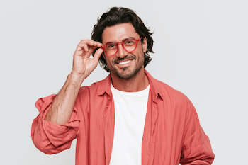 Confident Middle-Aged Man with Stylish Red Glasses