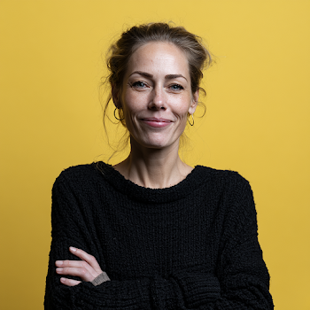 Confident Scandinavian Woman Smiling in Modern Studio