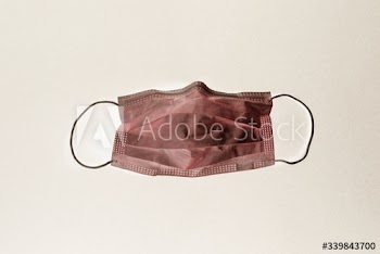 Contaminated medical face mask during coronavirus pandemic