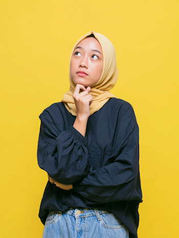 Contemplative Young Southeast Asian Woman in Hijab