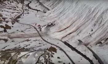 Controlled 700 Meter Avalanche Buries Swiss Road 7 Meters Of Snow