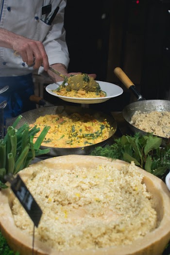 Cook scoops risotto 