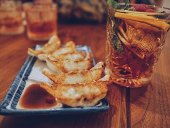 Cooked Breads Platter Beside Drink
