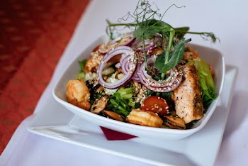 Cooked Dish With Green Vegetables And Sliced Onion