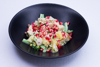 Cooked Food on Round Black Ceramic Bowl