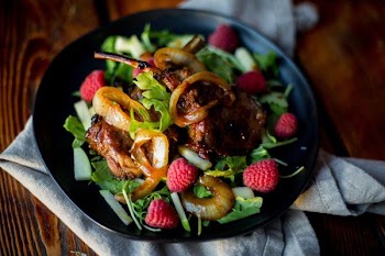 cooked food with raspbery