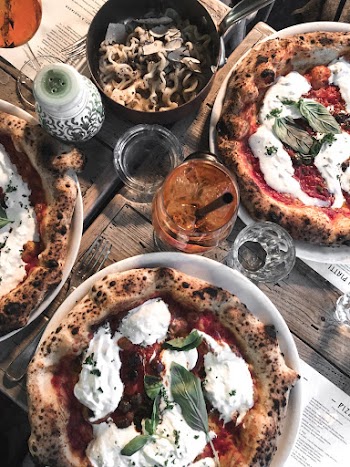 Cooked Pizza On Plates
