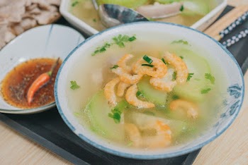 Cooked Soup Served on White Bowl