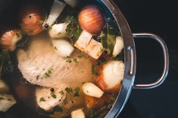 Cooking homemade chicken broth 