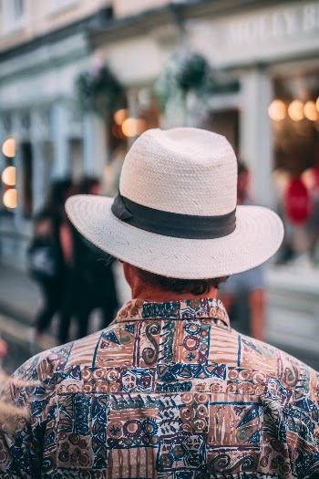 Cool dude, in a very cool hat. Love the shirt pattern as well. 