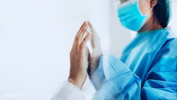 Coronavirus doctor touching family hand through a glass window | Free  photo - 2296515