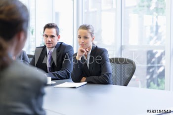 Corporate business people listening in conference room meeting