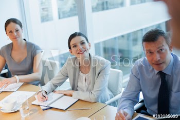 Corporate business people listening in conference room meeting