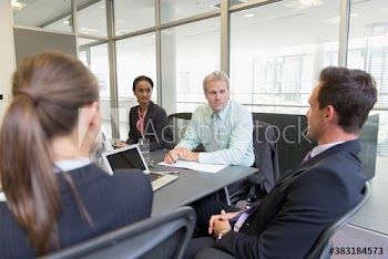Corporate business people talking in conference room meeting