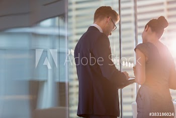 Corporate business people using digital tablet