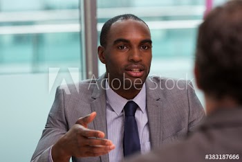 Corporate businessman talking in meeting
