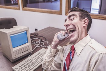 Corporate Worker on Phone Free Photo 