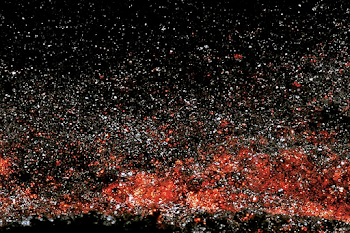 Cosmic Granular Texture: Abstract Macro of Dark Surface with Reflective Particles