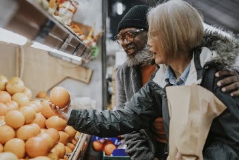 Couple at fresh market, buying | Free Photo - rawpixel