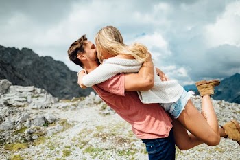 couple hugging and kissing
