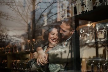 couple hugging inside house