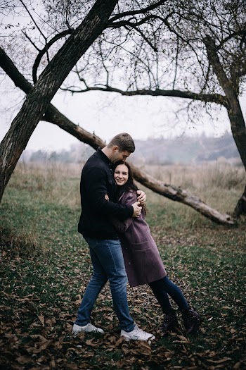 Couple Hugging Near Trees