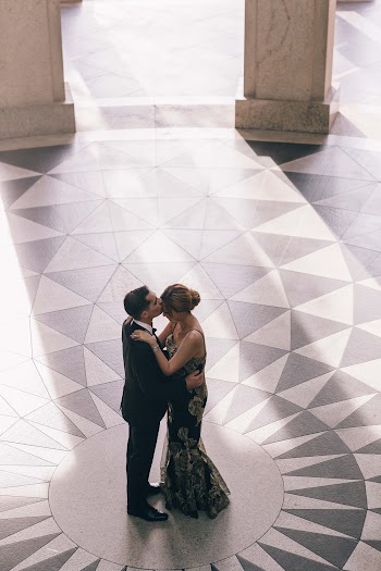 Couple in Building Embracing Each other