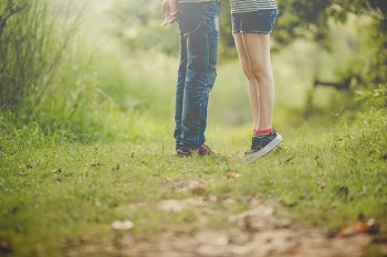 Couple kissing outdoors
