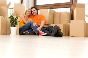 Couple sitting in new home