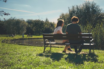 Couple sitting on a bench