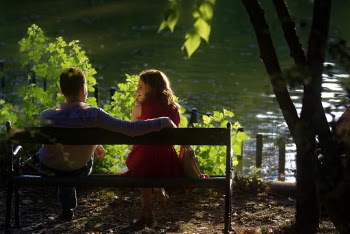 Couple Sitting on Bench