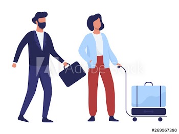 Couple standing in the airport with baggage