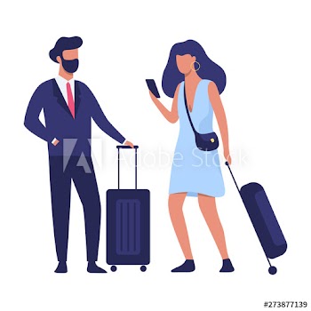 Couple standing in the airport with baggage