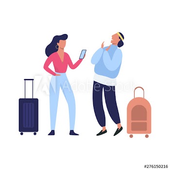 Couple standing in the airport with baggage