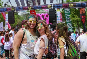 Couple Standing Near Signages