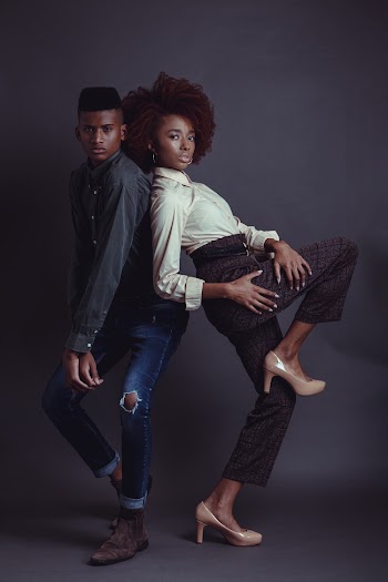 Couple Standing on Gray Floor