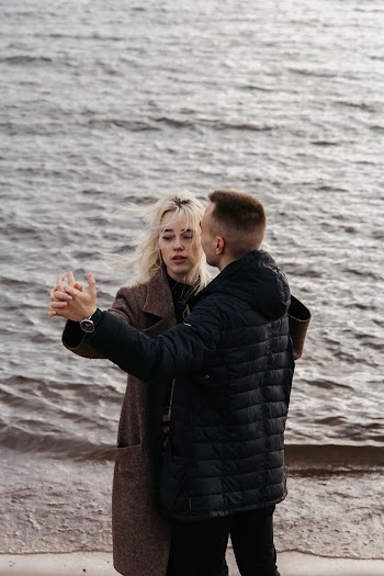 Couple Standing on Seashore
