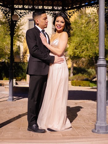 Couple Standing Under Gazebo