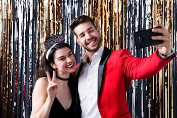 Couple Taking A Selfie At A Party