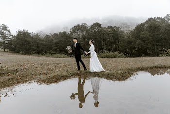 Couple Walk Near Body Of Water 