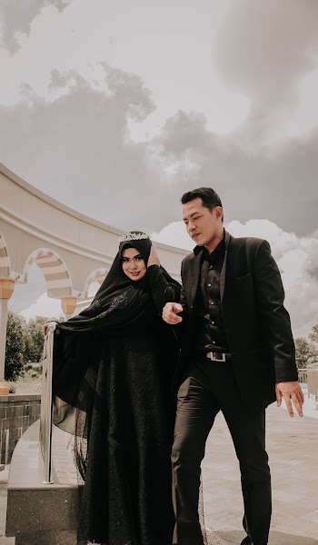 Couple Walking Next to Each other