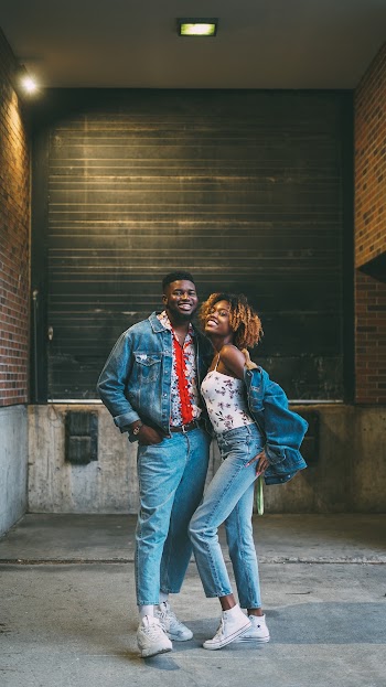 Couple Wearing Blue Denim Jacket